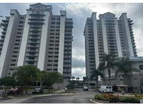 Two high-rise towers with balconies offering stunning views and convenient parking at 13415 Blue Heron Beach Dr # 304, Orlando, FL 32821