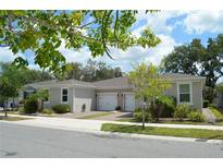 Charming single story home featuring a two-car garage and well-maintained landscaping at 1859 Shumard Ave, St Cloud, FL 34771