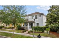 Charming two-story home with a well-manicured lawn and inviting curb appeal at 14314 Pleach St, Winter Garden, FL 34787