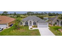 Beautifully landscaped single-Gathering home with well-maintained lawn and scenic surroundings at 3256 Countryside View Dr, St Cloud, FL 34772
