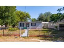 Charming single-story home with a fenced yard, offering a cozy and secure living space at 1814 Leroy Dr, Haines City, FL 33844