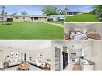 Charming single-story home with a well-maintained lawn, attached garage and neutral color palette at 1013 Carefree Cove Dr, Winter Haven, FL 33881