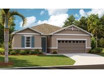 Charming single-story home with stone accents, manicured lawn and an attached two-car garage at 3645 Sublett Ave, Tavares, FL 32778