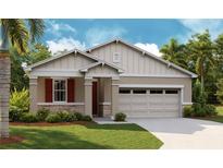Charming single-Gathering home with a two-car garage, stone accents and well-manicured lawn at 204 Flag Lilly Ln, Umatilla, FL 32784