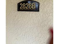 Close up of the building address sign at 2828 Club Cortile Cir # B, Kissimmee, FL 34746