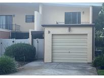 Exterior shot of the unit's garage and exterior entrance at 416 Howard Ave # D, Lakeland, FL 33815
