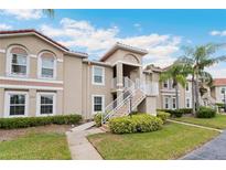 Charming condo with tile roof, private entrance and well-maintained landscaping at 2832 Osprey Cove Pl # 102, Kissimmee, FL 34746