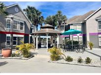 Relaxing community gazebo and outdoor seating area, perfect for enjoying the Florida weather at 3100 Parkway Blvd # 417, Kissimmee, FL 34747