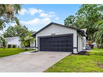 Charming single-Gathering home with a well-maintained lawn and a two-car garage perfect for suburban living at 3623 Tree Line Way, St Cloud, FL 34769