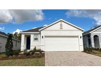 Charming single-Gathering home boasts a well-manicured lawn and a spacious two-car garage at 4067 Nw 44Th Cir, Ocala, FL 34482