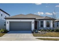 Charming single-story home featuring a two-car garage, neutral tones, and well-maintained landscaping at 4412 Sw 84Th Street Rd, Ocala, FL 34476