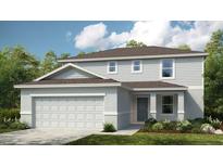 Two-story house with gray siding, three-car garage, and landscaping at 2022 Babbling Brook Blvd, Auburndale, FL 33823