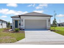 Charming single-story home with a two-car garage and well-maintained landscaping at 5915 Sw 87Th Ave, Ocala, FL 34481