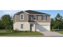 Two-story house with gray siding, white accents, and a two-car garage at 4735 Bold Peacock Bnd, Bartow, FL 33830
