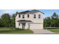 Charming two-story home with attached garage, manicured lawn and inviting curb appeal at 1337 Acorn Meadow Loop, Eustis, FL 32726