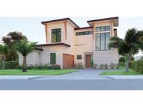 Beautifully landscaped two story home with modern architectural details at 607 Ellen Dr, Winter Park, FL 32789