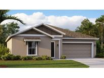 Charming single-story home with a well-manicured lawn and a neutral-toned facade at 263 Puma Loop, Groveland, FL 34736