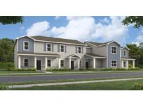 Charming two-story townhomes with stylish gray and blue exterior paint and covered front porches at 2023 Stake Out Way, Apopka, FL 32703