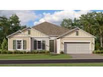 Charming single-story home with well-maintained lawn and neutral color palette at 286 Puma Loop, Groveland, FL 34736