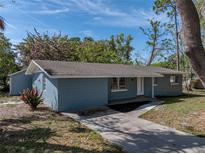 Charming single-story home with blue brick and well-maintained landscaping at 501 15Th Ne Ct, Winter Haven, FL 33881