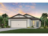 Charming single-Gathering home featuring a two-car garage, landscaped yard, and inviting entryway at 5408 Sw 85Th Avenue Rd, Ocala, FL 34481