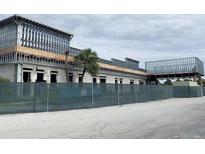 Commercial building under construction with steel framework and concrete block walls at 7900 S Orange Blossom Trl # 1099, Orlando, FL 32809