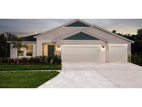 Charming single-Gathering home with a two-car garage, well-manicured lawn, and beautiful landscaping at 1022 Brimstone Cir, Winter Haven, FL 33884