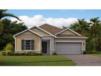 Charming single-story home featuring a traditional design, lush landscaping, and a two-car garage at 611 Terrapin Dr, Debary, FL 32713