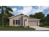 Charming single-story home featuring a two-car garage, neutral stucco exterior, and beautifully landscaped front yard at 4730 Golden Knight Blvd, Kissimmee, FL 34746