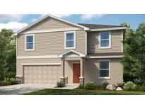 Charming two-story home with a two-car garage and a welcoming front entrance at 2402 Slippery Rock St, Auburndale, FL 33823