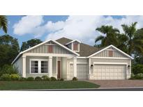 Charming single-story home with neat landscaping, and a two-car garage at 2095 Rider Rain Ln, Apopka, FL 32703