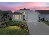 Charming single-story home with manicured landscaping, beautiful lawn, and attached one-car garage at 6229 Raven Run, Lakeland, FL 33809