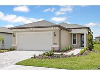 Charming single-story home featuring a two-car garage, landscaped yard, and neutral color palette at 5844 Sw 87Th Ave, Ocala, FL 34481