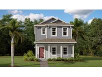 Charming two-story home featuring a cozy front porch and well-maintained landscaping at 785 Middleton St, Debary, FL 32713