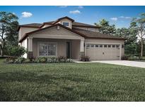 Charming two-story home with landscaped yard, covered porch and a two car garage at 3335 Chinotto Dr, Lake Alfred, FL 33850