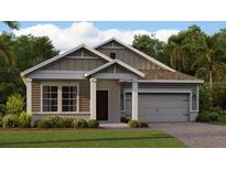 Charming single-story home with a well-manicured lawn and a two-car garage in a lovely neighborhood at 703 Peroni Ave, Debary, FL 32713