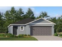 Charming single-Gathering home with a two-car garage, simple landscaping, and modern architectural details at 3043 Totem Rd, Eagle Lake, FL 33839
