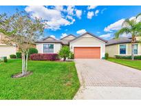 Charming single-story home with a well-manicured lawn and inviting curb appeal at 518 Cortez Dr, Davenport, FL 33837