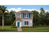 Charming two-story home featuring light gray siding, stone accents, a blue front door, and lush landscaping at 3013 Howley Aly, St Cloud, FL 34771