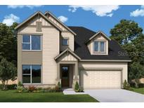 New two-story home featuring a two-car garage and craftsman-style details at 16954 Cedar Valley Cir, Clermont, FL 34711