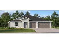 Beautiful single-story home featuring a three-car garage, well-manicured lawn, and neutral-toned exterior at 2109 Lasso Loop, Eagle Lake, FL 33839