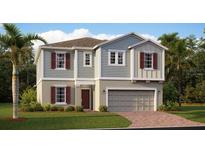 Charming two-story home with a two-car garage and well-maintained landscaping at 2507 Peace Of Mind Ave, Kissimmee, FL 34744