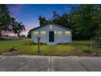 Charming one-story home featuring a well-maintained lawn, simple landscaping, and a cute mailbox at 528 S Seminole Ave, Fort Meade, FL 33841