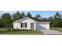 Charming single-story home with a well-manicured lawn and attached two-car garage at 1133 Hour Glass Rd, Lakeland, FL 33801