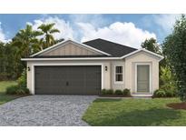 Charming single-story home with a brick driveway and attached two-car garage at 4015 Gardenia Ave, Lake Hamilton, FL 33851