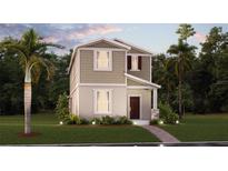 Charming two-story home featuring a landscaped yard and inviting front entrance at 2437 Spring Tune Aly, Kissimmee, FL 34744