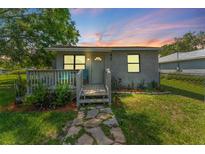 Charming single-story home with a cozy front porch and a well-maintained yard at 652 N Jackson St, Eagle Lake, FL 33839