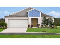 Charming single-Gathering home with a two-car garage and inviting curb appeal at 1716 Vanilla St, Haines City, FL 33844