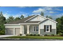 Charming single-Gathering home features a modern design, two-car garage, and well-maintained landscaping at 12898 Harvest Rain Ave, Winter Garden, FL 34787