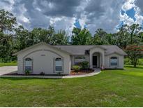 Charming single-story home featuring a well-manicured lawn and inviting curb appeal at 3952 Laurel Branch Dr, Lakeland, FL 33810
